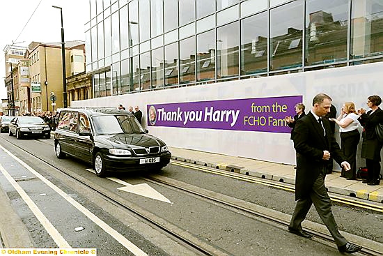 THE funeral cortege of First Choice Homes chairman Harry Burns passes the organisation’s new building in Union Street