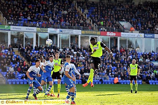 HIGH FLIER . . . Genseric Kusunga leaps to power a header into the Peterborough net for Athletic’s second goal. 