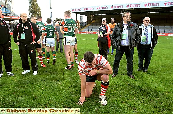 Hands in pockets, Oldham chairman Chris Hamilton stands dejected after another Grand Final defeat. 