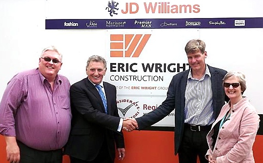 BUILDING for the future . . . (from left) Councillor Howard Sykes, Eric Wright, of Eric Wright Construction, Ian Carr, JD Williams logistics director, and Liz Fryman, of Oldham Council