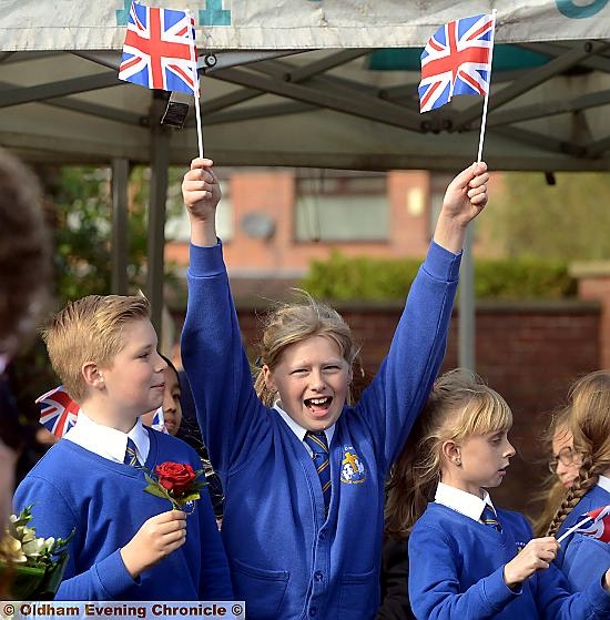 Pupils from St. Matthew's School - including flag-waving Sophie Norman (10) greeted the duchess