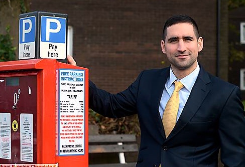 Joseph Hossein, from Maya Solicitors, claims that motorists are left confused by the free parking instructions (below) on the parking meters around Oldham.