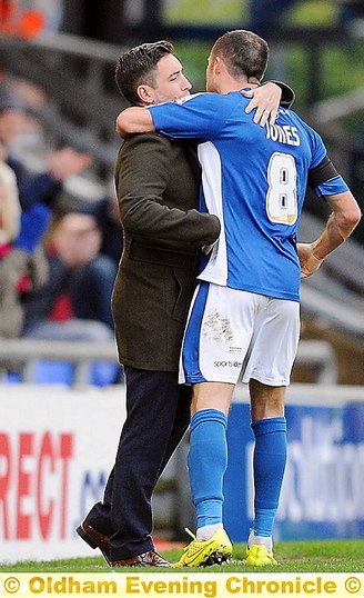 MIKE Jones celebrates his goal with manager Lee Johnson.