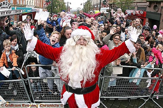 Santa arrives in Oldham town centre. 