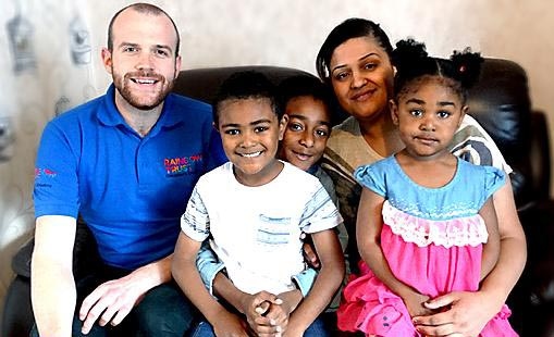HELPING families: Rainbow Trust family support worker Sean Tansey with Zerina Whyte and her family, who he supports