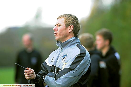 GUIDING HAND: new Athletic first-team coach Dean Holden issues instructions from the sidelines. 