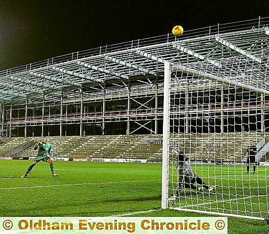 SPOT OF BOTHER: Athletic goalkeeper Neil Etheridge watches in dismay as his vital penalty kick sails over the crossbar.