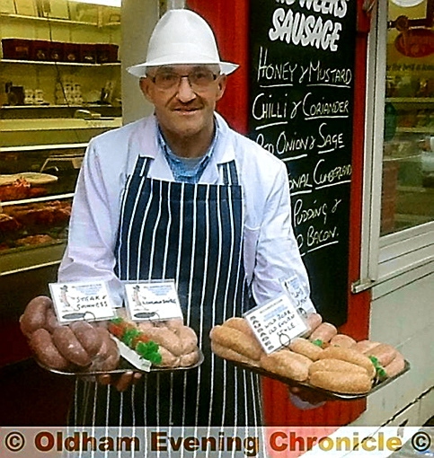 TASTY treat . . . butcher Bill Harrison with his sausages