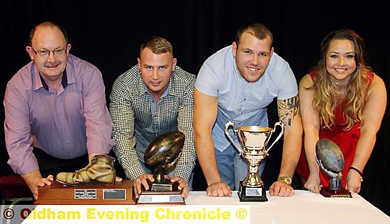 TOP TABLE: Rev Tony Ford (left), forward pair Danny Langtree and Josh Crowley and masseuse Beth Pankiw all picked up trophies in recognition of their efforts at last night’s Oldham Rugby League Club 2014 season awards evening.