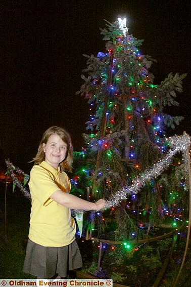 TREE-MENDOUS . . . Jessica Knight at the Greenfield display