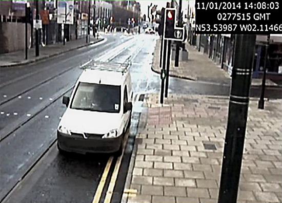 PARKING mad . . . a van on double yellow lines, blocking tram tracks and adjacent to a crossroads 