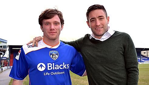 LOAN player John Paul Kissock is greeted by manager Lee Johnson following his arrival from Macclesfield. 