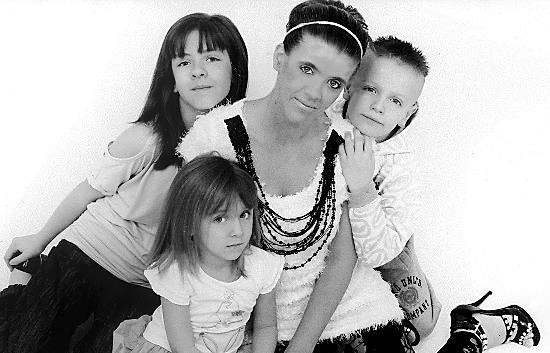 Charlene before her illness, with children Shannon, Connor and Courtney  

