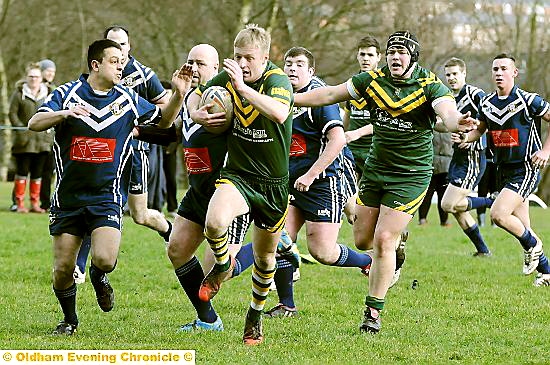 FULL STEAM AHEAD . . . Nathan Jewitt of St Anne’s heads for the try line. 