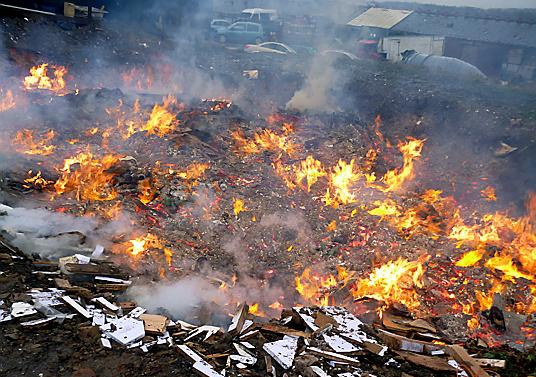 ABLAZE . . . rubbish burned at Whitfield Dairy Farm, in Shaw, included waste such as wiring, wood and a toilet from house clearances 
