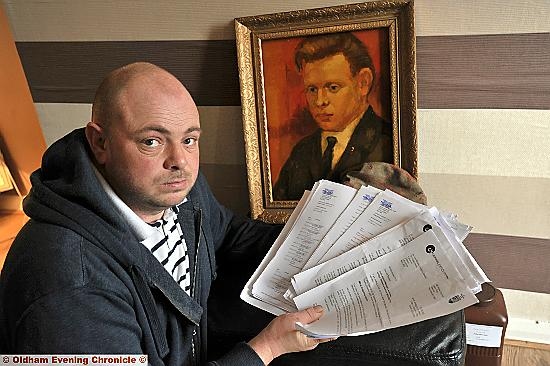 FIGHTING for his father: John Bowden with the dozens of letters he sent trying to reclaim £50,000 stolen from his late father’s account 
