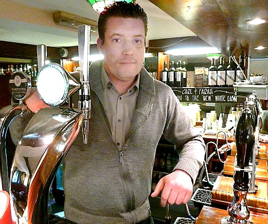 ANGER . . . White Lion landlord Carl Benton was assaulted in his own pub