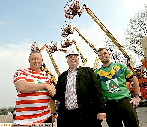 PUT IT THERE: Oldham RL chairman Chris Hamilton is flanked by A-Plant manager Wayne Maddocks (left), and Mike Humphreys (assistant manager). 