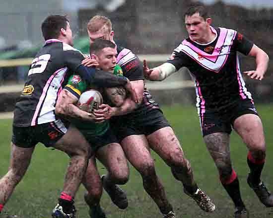 NOWHERE TO GO . . . Oldham RL’s Tom Whitehead is stopped in his tracks. 
