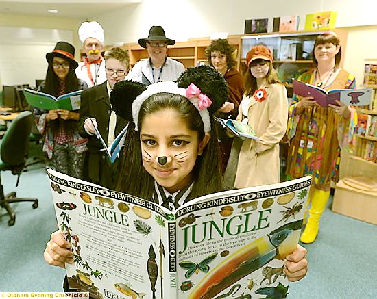 RADCLYFFE School pupil Nimra Farooq (front) celebrates World Book Day yesterday with (back, from left) Alima Begum, assistant headteacher Dr Dave Burns, Zak Robinson, author-in-residence Mark Wright, Harrison Radcliff, Cara Hall and school librarian Janine Wild. 