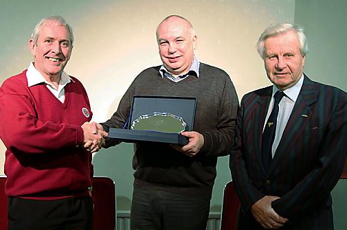 FAREWELL . . . chairman John Watts (left) and president Malcolm Hill (right) present Damian Cunningham with a silver plate to mark his long service 
