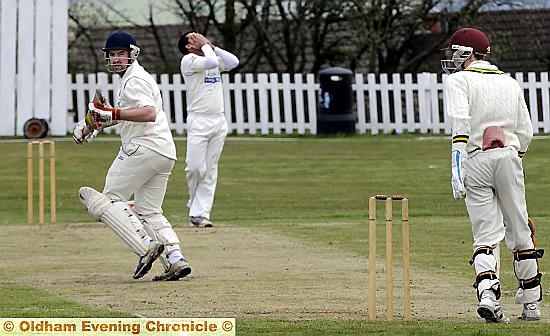 OH NO . . . Saddleworth’s Daniel Hesford hits a four as Austerlands bowler Asif Zafir holds his head. 
