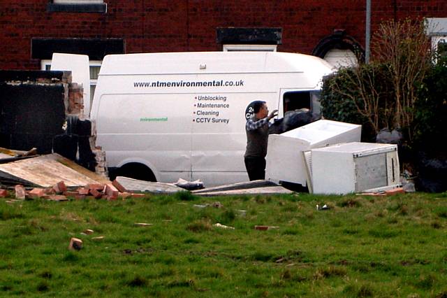 Caught in the act: fly-tippers unload their van 
