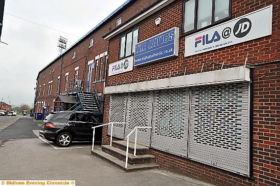 ON THE MOVE . . . the club shop at Boundary Park is relocating to the new North Stand 
ATHLETIC officials have reacted with caution to reports that the club could be set to sign a large commercial deal with Sports Direct. 
