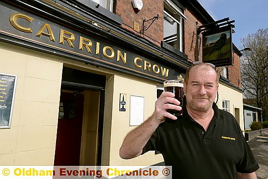 A GREAT PINT . . . Carrion Crow landlord Tony Robins 
