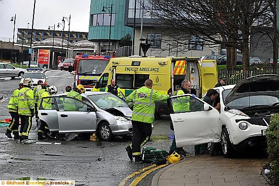WRECKAGE . . . emergency service attend the accident in Waterloo Street 

