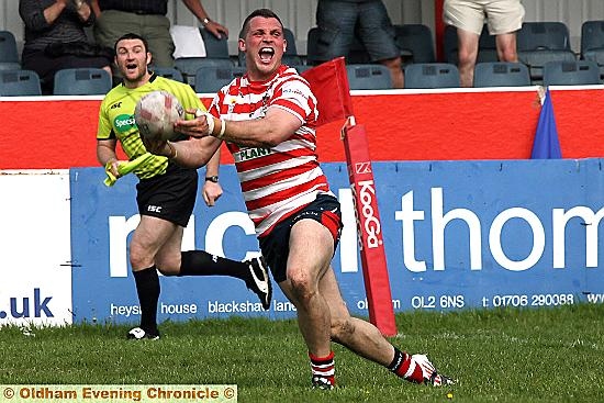 PLENTY TO SMILE ABOUT: Steven Nield can’t hide his delight after scoring the 77th-minute try that won the game for Oldham. 