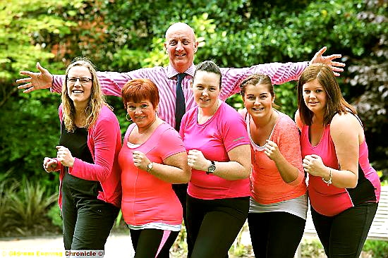 Chronicle managing editor David Whaley with his team of runners: L-R Karen Doherty, Tracey Holmes, Hayley Yates, Niamh Stuart and Sarah Tate. 