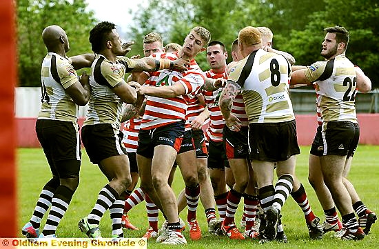 FLARE-UP: Oldham’s Nathan Mason clashes with a London Skolars player in yesterday’s Championship One tussle at Whitebank.