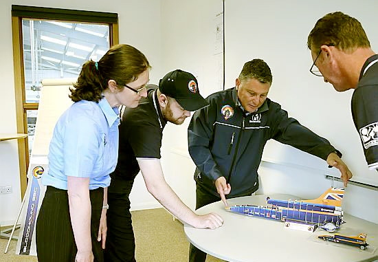 GOING for the record: Tony Syddall (second from right) discusses the Bloodhound project with MetConnect colleagues (left to right) Stephanie Dibrow, Chris Gould and Nick Rush