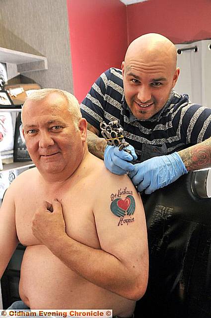 Martin Jones has a Dr Kershaw Hospice tattoo at Brass Knuckles Tattoo's by Andy Deblasio