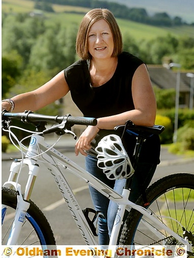 SADDLING up: Jo Taylor gears up for a 60-mile bike ride during her chemotherapy treatment