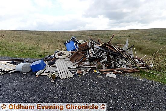 Rubbish including asbestos left in a lay-by on Marsden Moor, Huddersfield Road, on the border of Denshaw and Kirklees. 