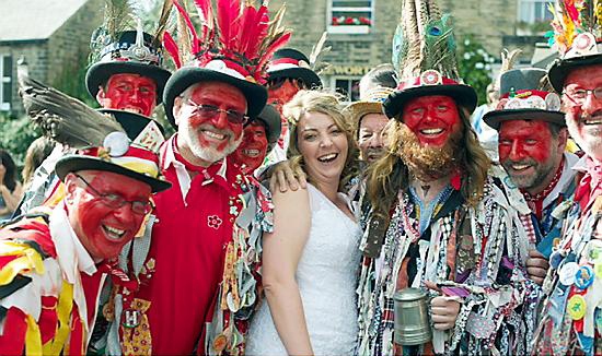 BRIDE Vicky with members of the Morris Men. 
