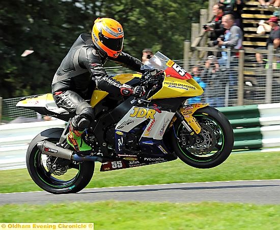 ASHLEY Beech pulls a wheelie as he goes through the gears at Cadwell Park.
