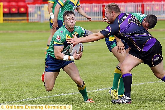 Oldham’s Danny Whitmore evades a Gateshead player during the last meeting of the two sides, won by Oldham 32-14.