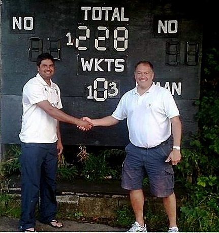 SAME AGAIN: Saddleworth pro Imran Aslam has returned home, but has been signed to return next season. He is pictured with club cricket chairman Steve Howard.