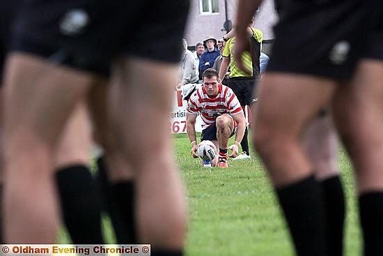 MIND THE GAP: Steven Nield lines up a kick at goal during Oldham’s hammering of Gloucester All Golds. PICTURE: PAUL STERRITT