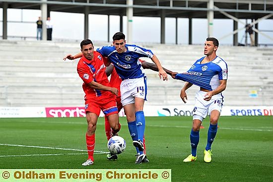 CONOR Wilkinson tries to make his presence felt in the Gillingham penalty area.