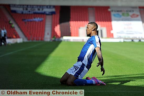 WHAT A FEELING . . . Jonson Clarke-Harris celebrates his first goal of the season at Doncaster.