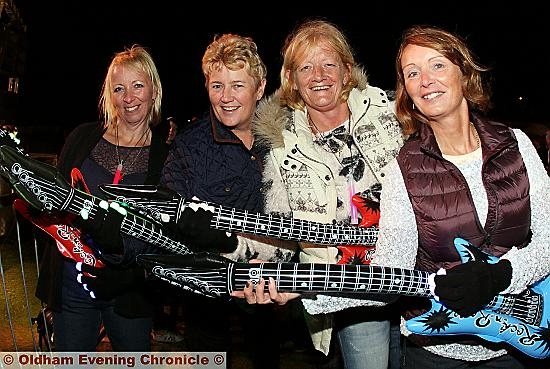 AIR GUITAR HEROES: Tanya Runacre, Michelle Longley , Jackie Hewitt, and Melanie Mitchell play along to the music