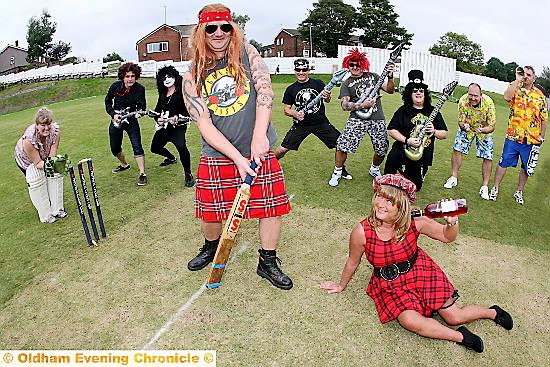 SWAPPING guitars for cricket bats... teams dressed up as their favourite rock idols for the challenge