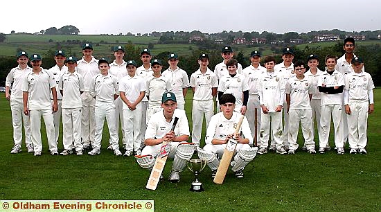 LINE UP . . . Saddleworth and Shaw under-15s players are fronted by team captains Arron Birtwhistle (Shaw, left) and centurion James Howard. PICTURE: PAUL STERRITT