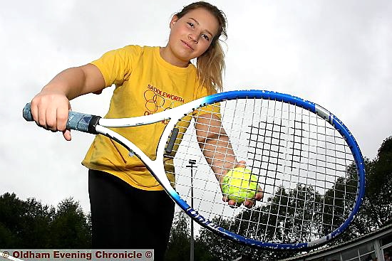LIMBERING up: Annabelle Simister (16) gets ready to play tennis for Diggle in the Saddleworth Olympics. Pictures: PAUL STERRITT