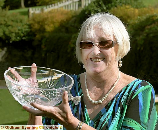 PROUD moment . . . Alma crowned the 2014 Woman of Oldham