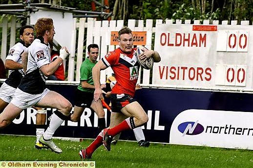 ALL SQUARE: Oldham’s Richard Lepori races clear to score in the Whitebank meeting with the All Golds last season.